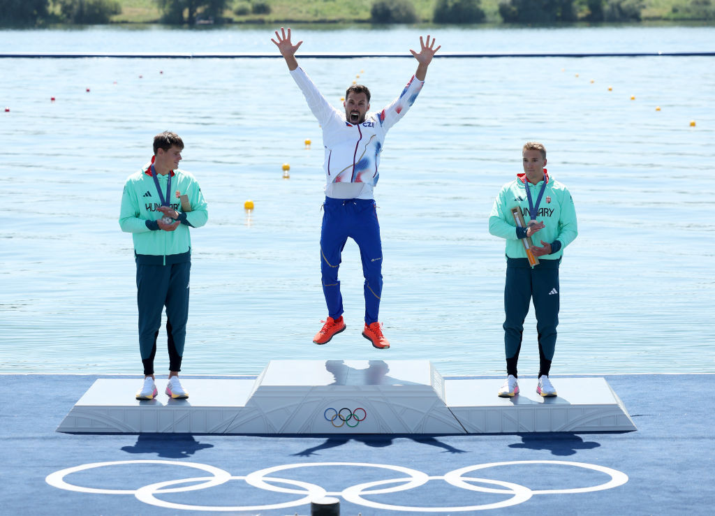 Josef Dostal celebrates on the podium with Adam Varga and Balint Kopasz. GETTY IMAGES