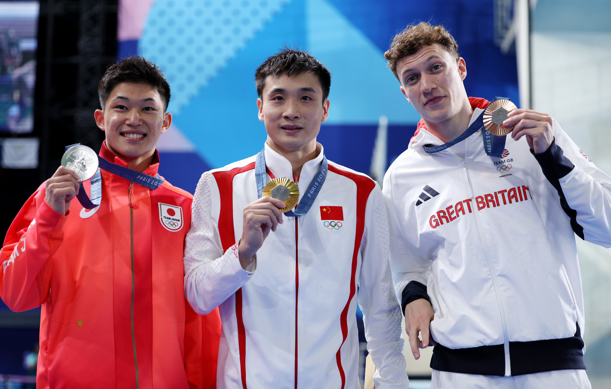 Cao Yuan successfully defended his title in the men's 10-metre platform diving. GETTY IMAGES