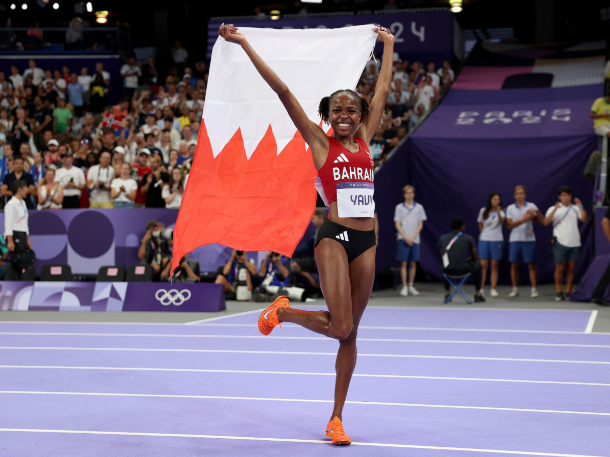 Winfred Yavi of Team Bahrain celebrates winning the gold medal after competing in the Women's 3000m Steeplechase Final at the Paris 2024 Olympic Games. GETTY IMAGES