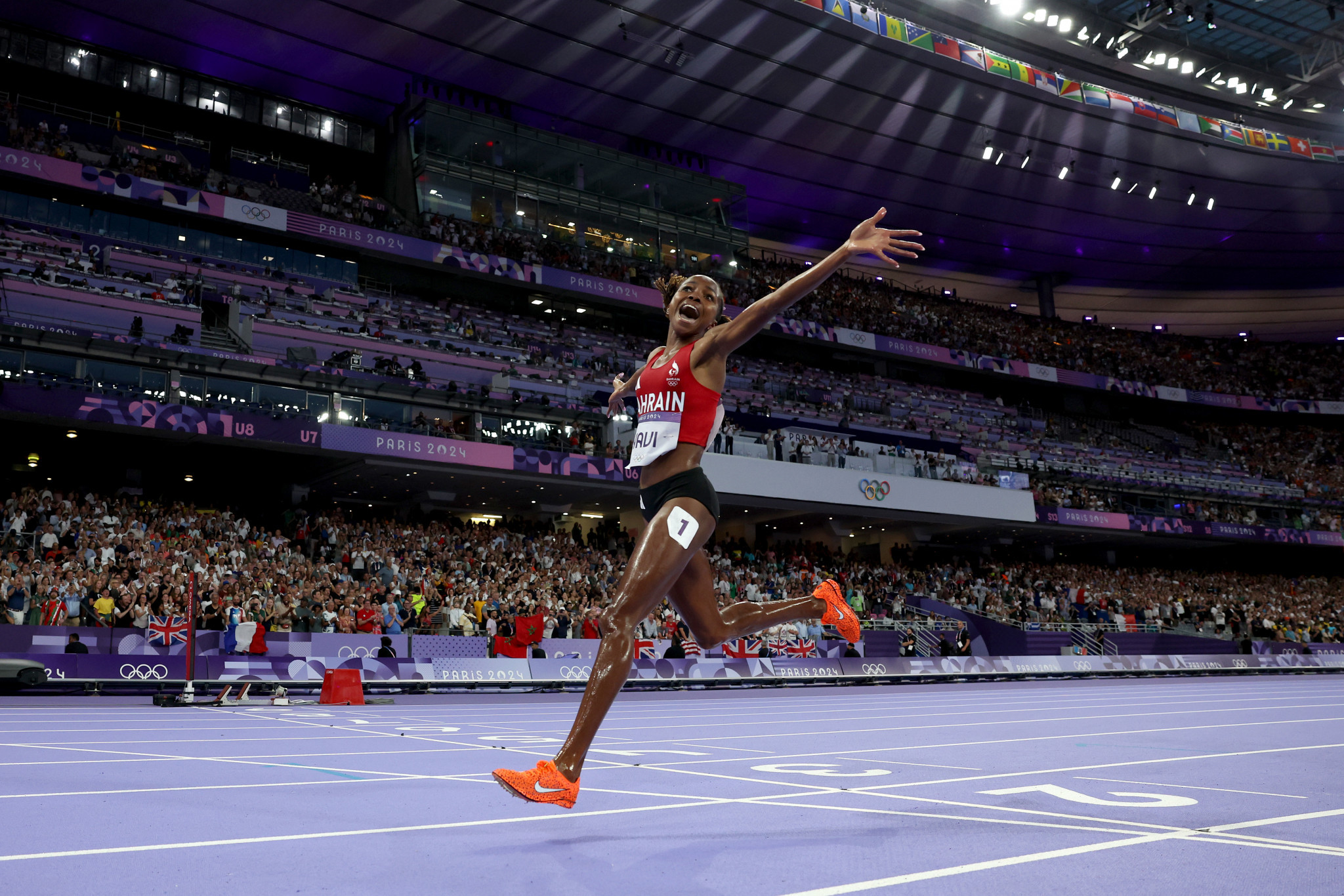 Winfred Yavi crosses the finish line to win the gold medal in the Women's 3000m Steeplechase. GETTY IMAGES