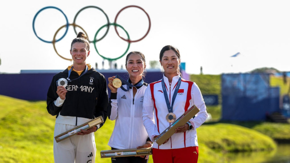 Women's golf podium: Lydia Ko, Esther Henseleit, and Xi Yu Janet Lin. GETTY IMAGES