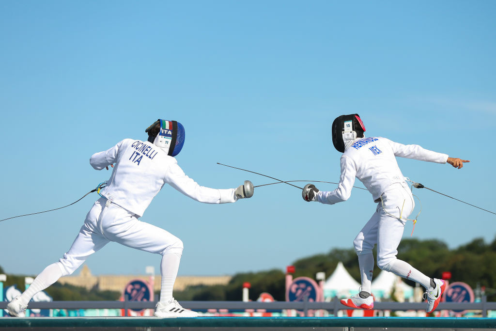 Matteo Cincinelli of Team Italy and Emiliano Hernandez of Team Mexico compete in the Fencing portion. GETTY IMAGES