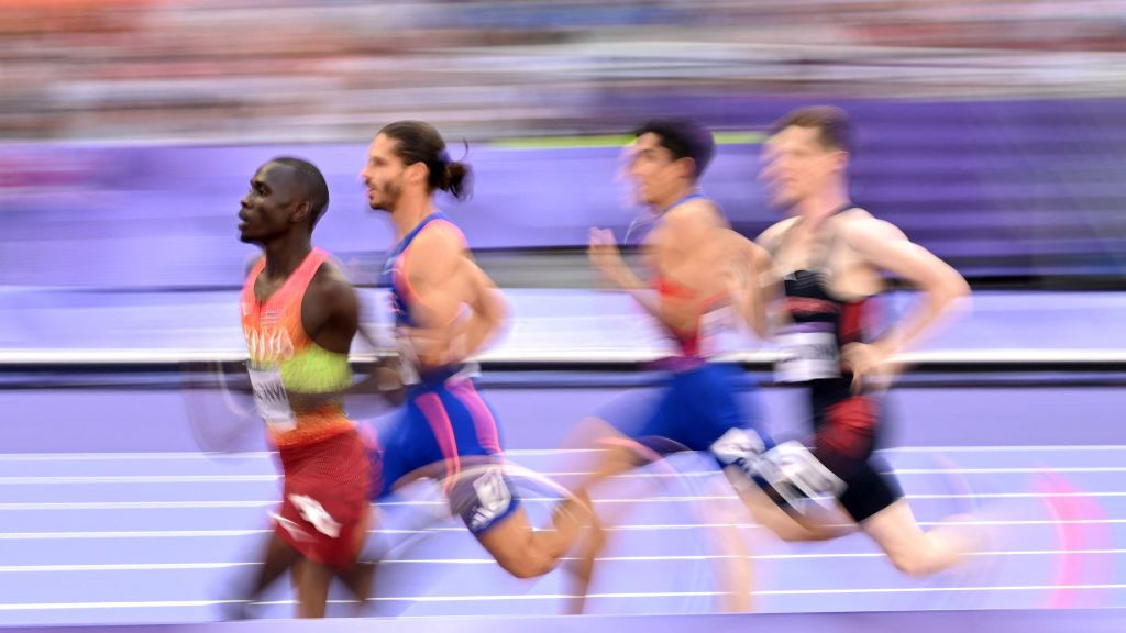 Kenya's Emmanuel Wanyonyi (L) and France's Gabriel Tual (2nd L) compete in the men's 800m final. GETTY IMAGES