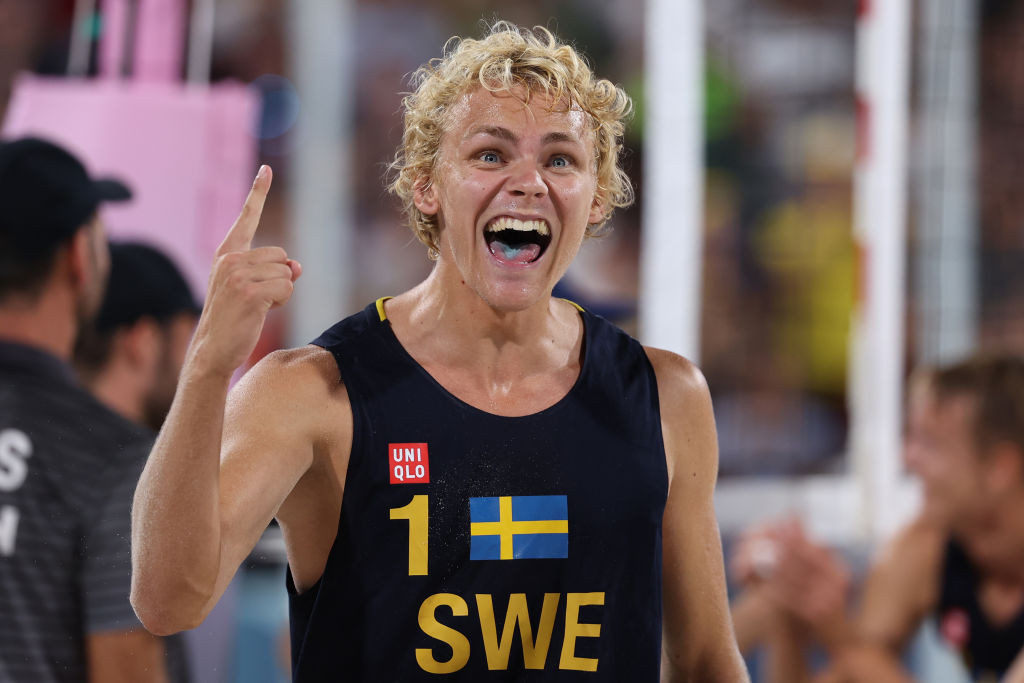 David Ahman of Team Sweden celebrates after winning the Men's Gold Medal match against Nils Ehlers and Clemens Wickler of Team Germany. GETTY IMAGES