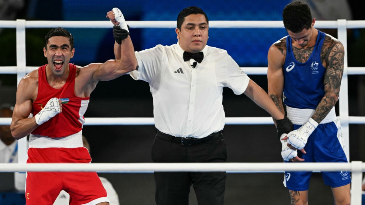 Khalolov celebrates one of his victories. The Uzbek boxers have dominated the tournament in Paris. GETTY IMAGES