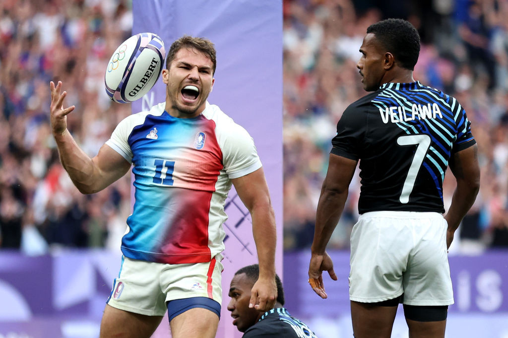 Antoine Dupont celebrates after scoring a try. GETTY IMAGES