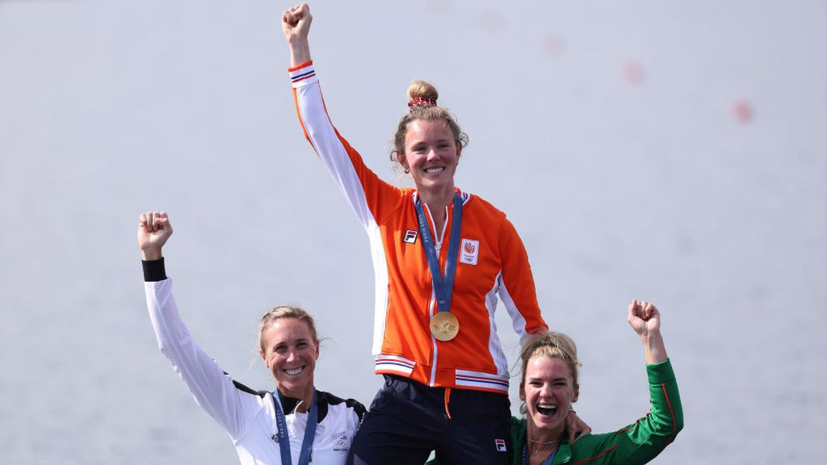 Silver medal Emma Twigg of New Zealand, Gold medal Karolien Florijn of Netherlands and Bronze medal Viktorija Senkute of Lithuania celebrate at the medal ceremony. GETTY IMAGES