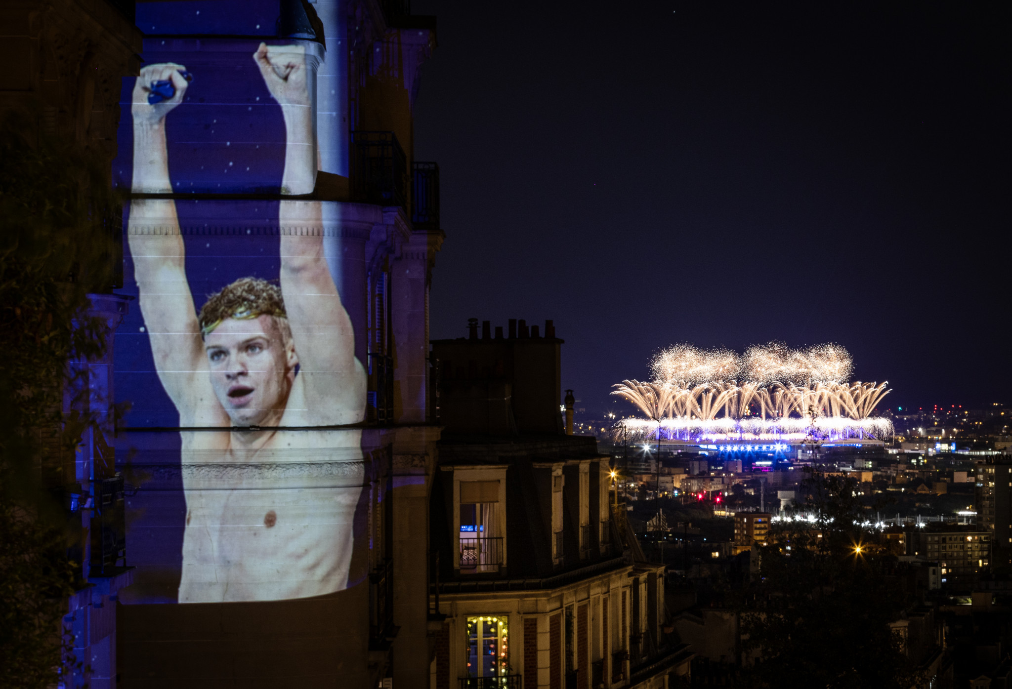 A photograph of Swimming gold medalist Leon Marchand celebrating. GETTY IMAGES