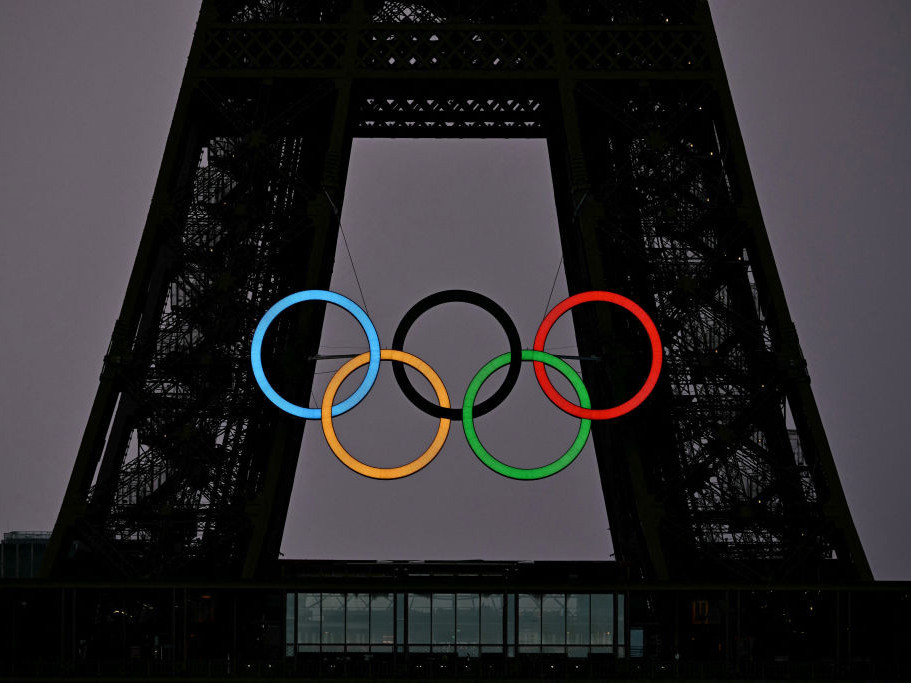 A man was spotted free climbing the Eiffel Tower just hours before the Olympics came to a close. GETTY IMAGES