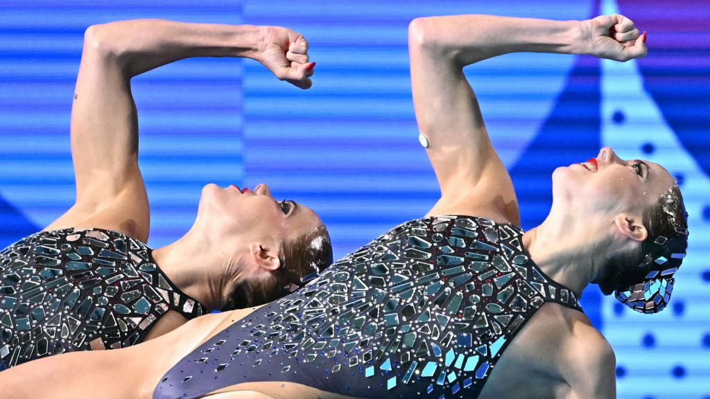 Netherlands' Bregje De Brouwer and Netherlands' Noortje De Brouwer compete in the duet technical routine . GETTY IMAGES