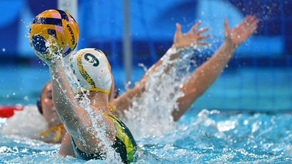 Australia's #09 Zoe Arancini attempts a shot in the women's water polo gold medal match between Australia and Spain. GETTY IMAGES