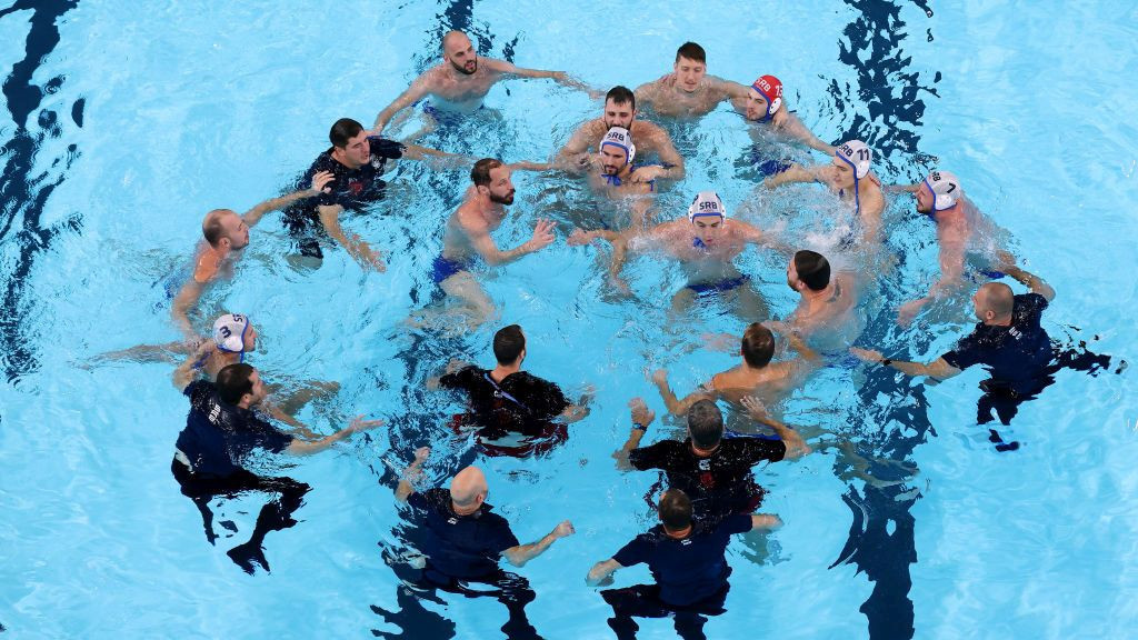 Team Serbia celebrate after winning gold following victory. GETTY IMAGES