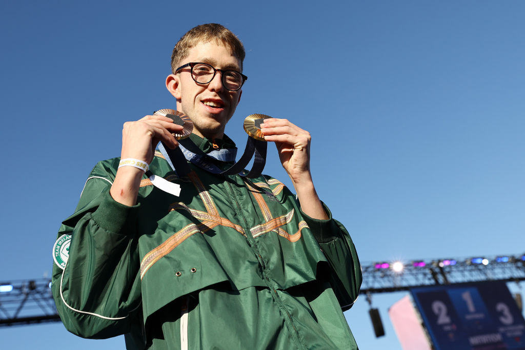 Daniel Wiffen of Team Ireland poses with his Men's Freestyle Swimming medals GettyImages