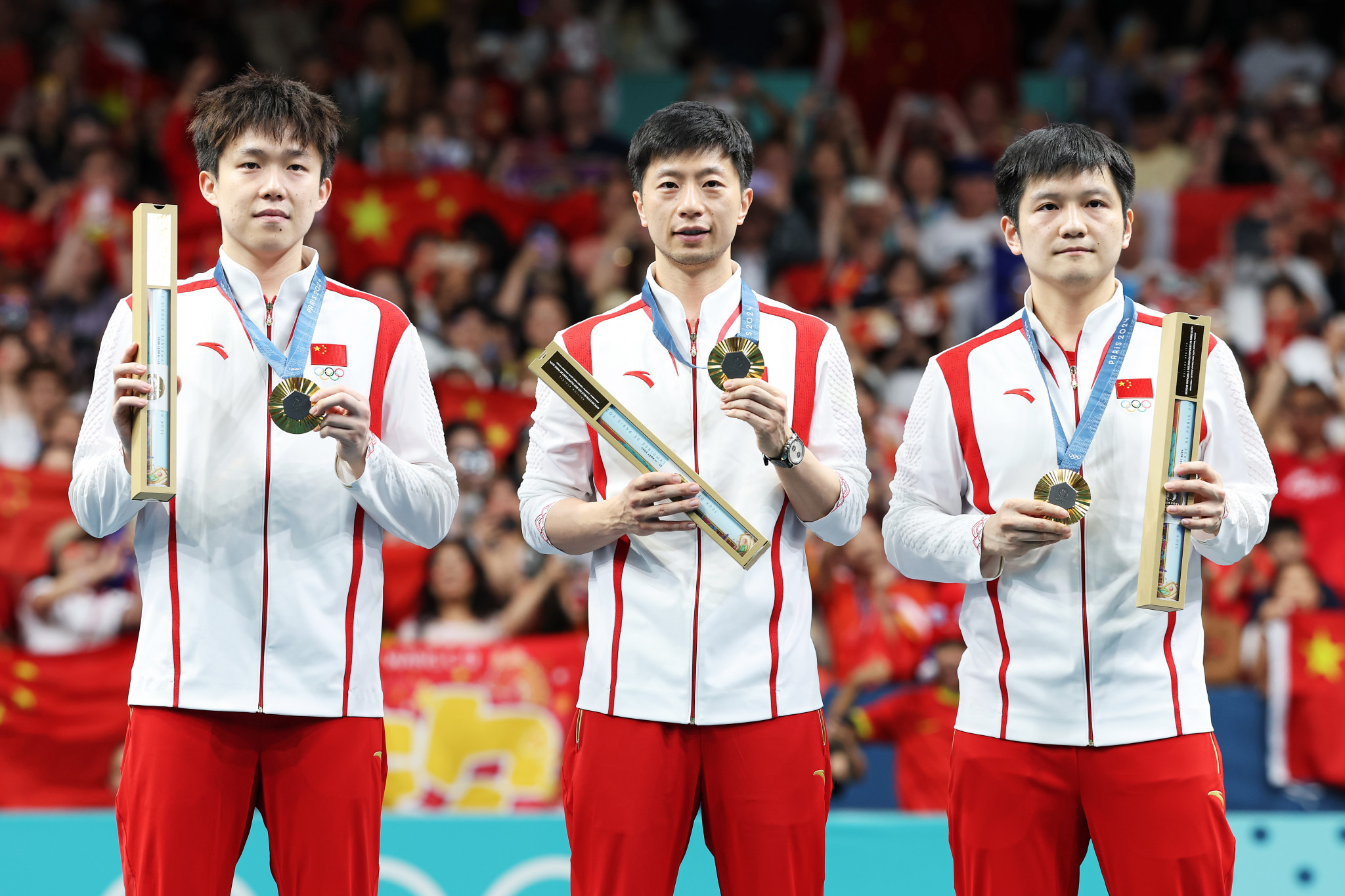 Team China made a fifth gold in the men's team event. GETTY IMAGES