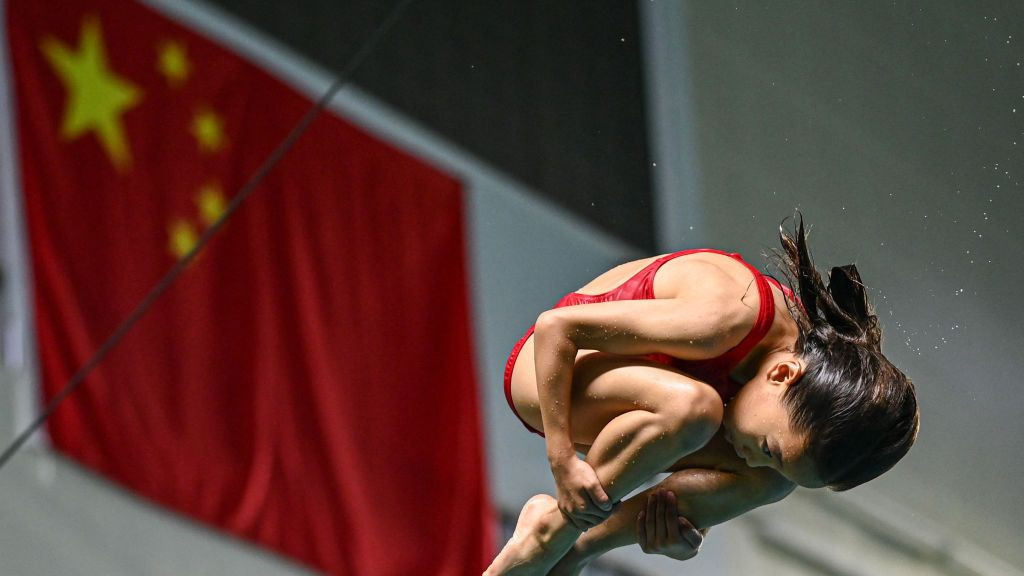 a young diver during a training session at Muxiyuan sport school in Beijing. GETTY IMAGES