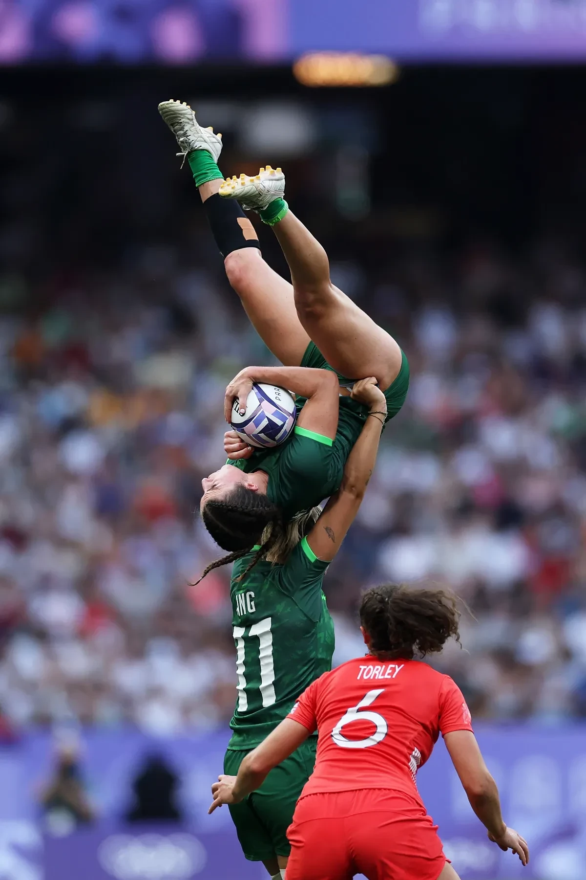 Ireland’s Emily Lane and Erin King teamed up for an incredible catch, certainly defying gravity. CAMERON SPENCER/GETTY IMAGES