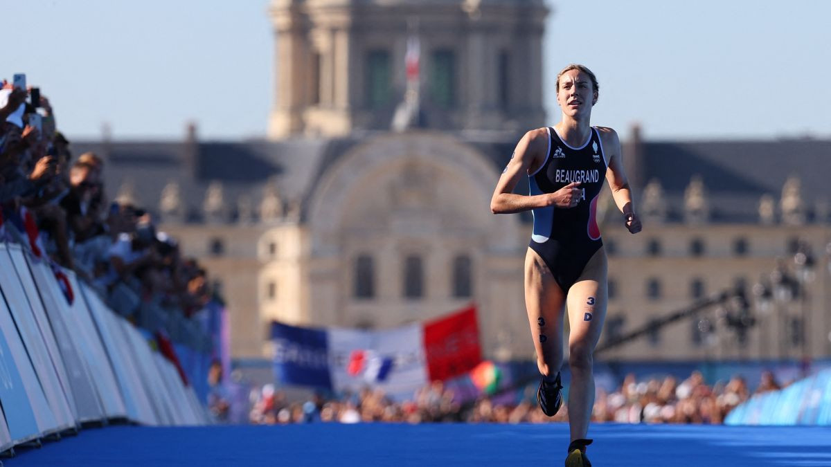 Cassandre Beaugrand crosses the finish tape to win the gold medal. GETTY IMAGES