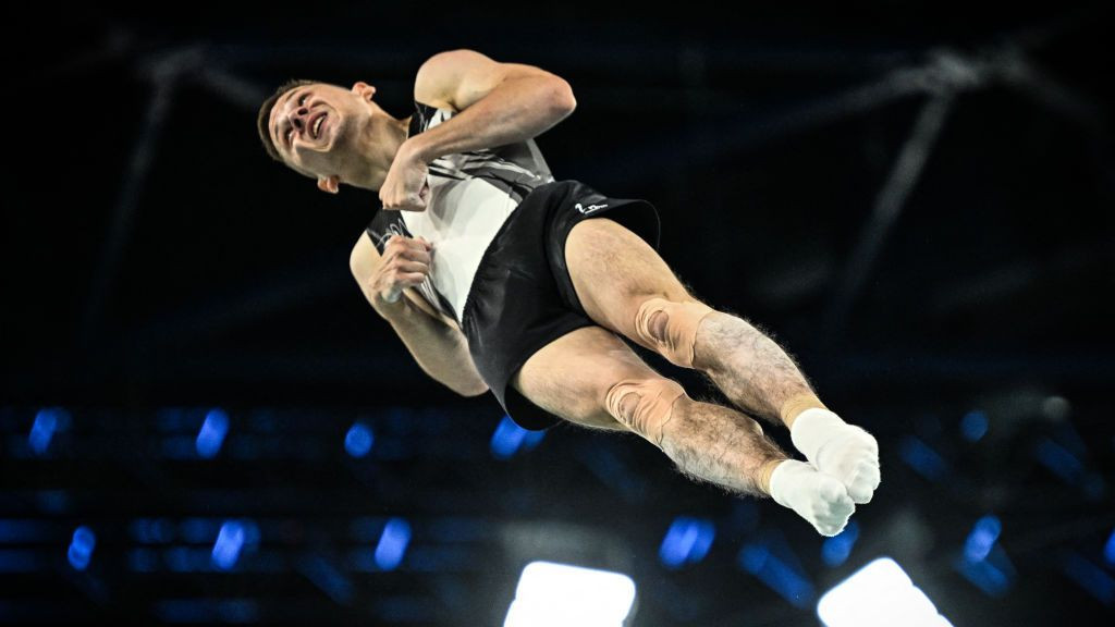 Neutral Athlete Ivan Litvinovich competes in the Men's Trampoline Gymnastics final. GETTY IMAGES