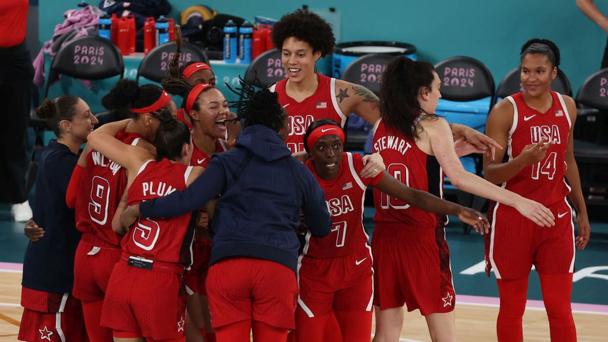 Team USA celebrate after their victory against France in the women's final. GETTY IMAGES