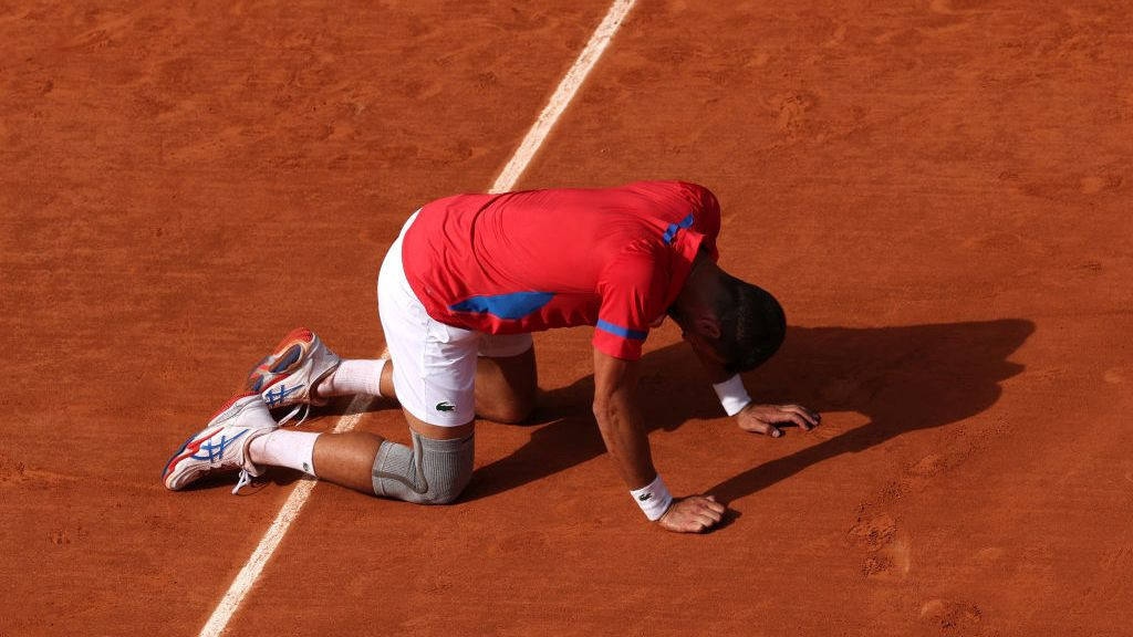 Novak Djokovic of Team Serbia celebrates match point during the Men's Singles Gold medal match against Carlos Alcaraz. GETTY IMAGES