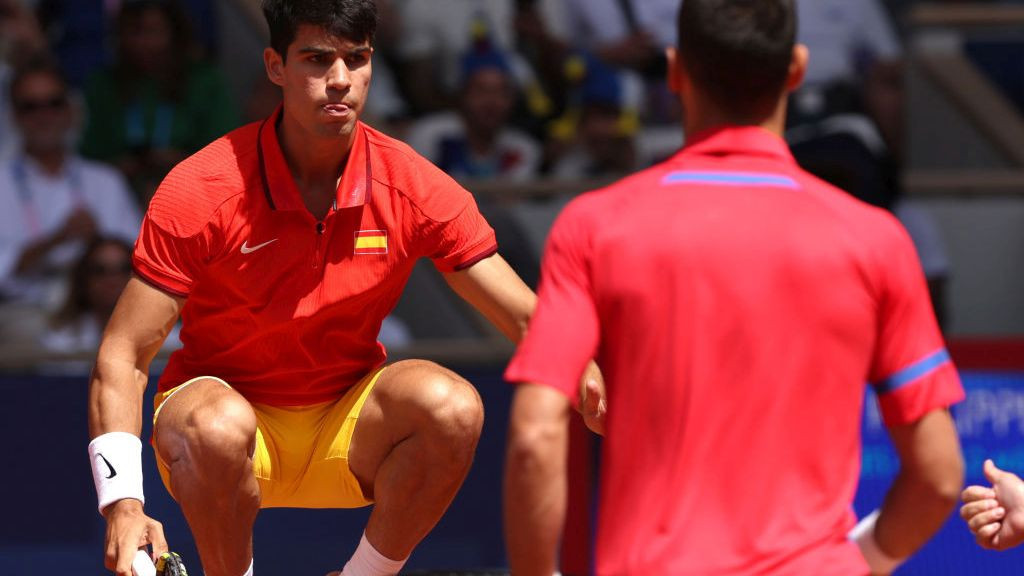  Carlos Alcaraz of Spain jumps to the coin toss during the Men's Singles Gold medal match against Djokovic. GETTY IMAGES