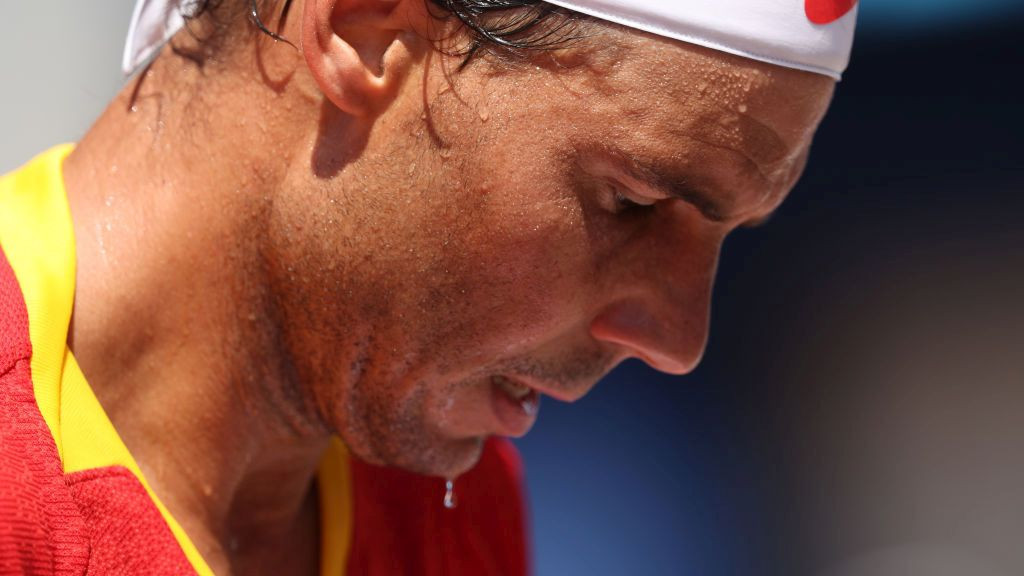 Rafael Nadal of Team Spain shows his dejection against Novak Djokovic of Team Serbia . GETTY IMAGES