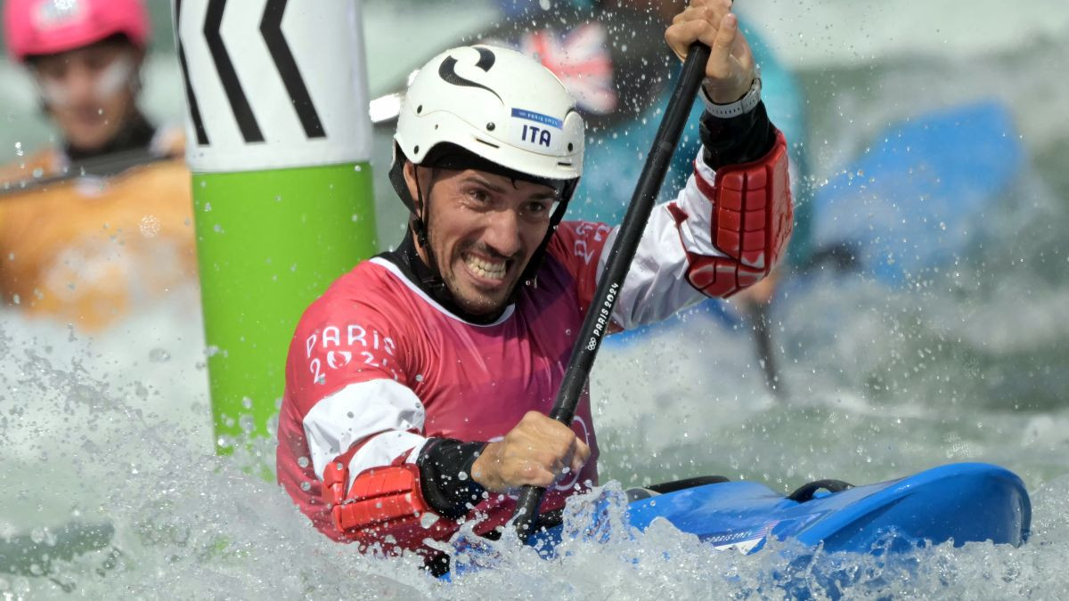 Giovanni De Gennaro competes in the men's kayak cross heats canoe slalom competition. GETTY IMAGES