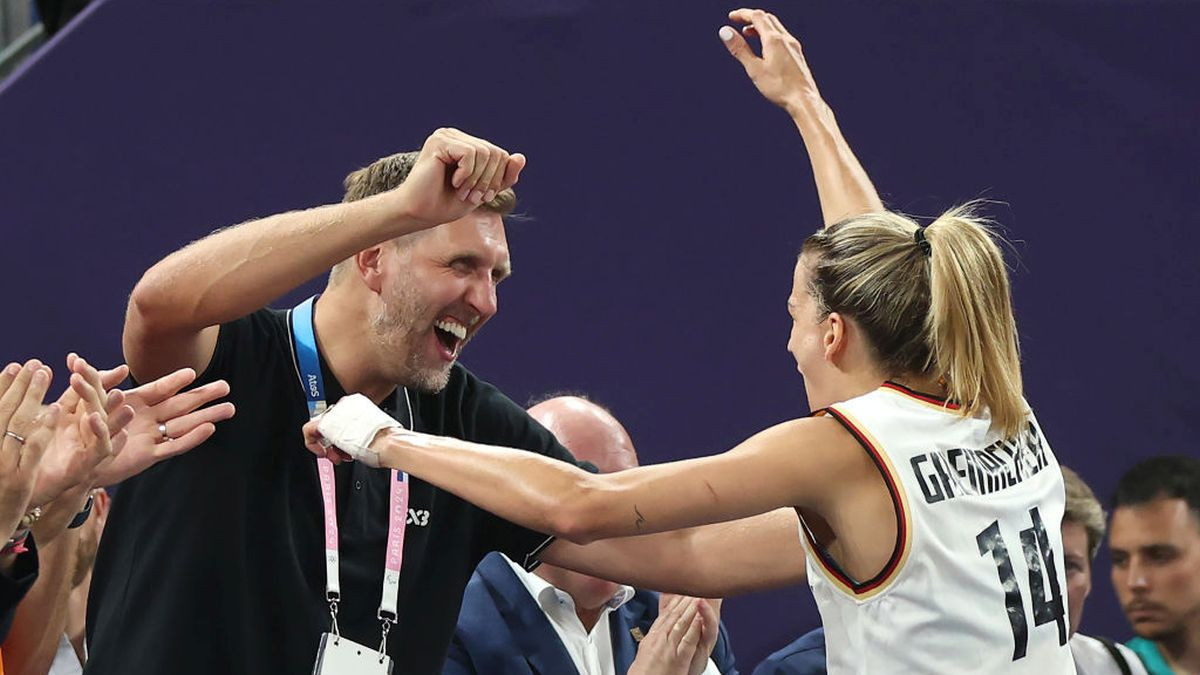 Former NBA player Dirk Nowitzki celebrates with Sonja Greinacher. GETTY IMAGES