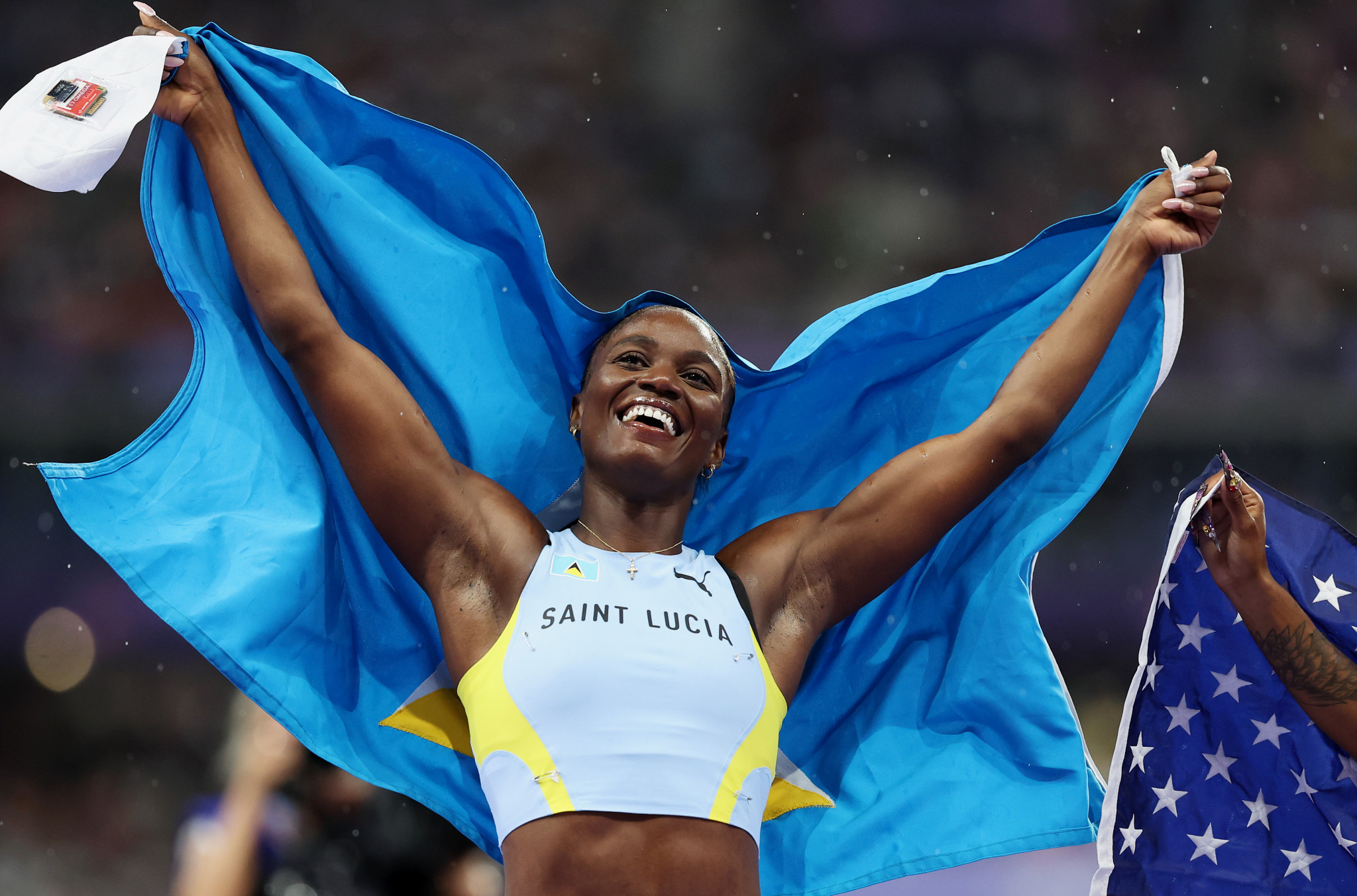 Julien Alfred of Team Saint Lucia celebrates winning the gold medal during the Women's 100m Final at the Paris 2024 Olympic Games. GETTY IMAGES