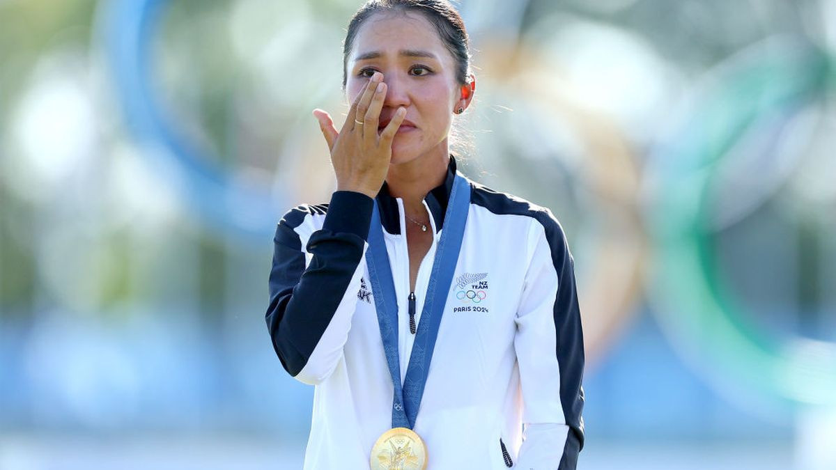 Lydia Ko of Team New Zealand reacts on the podium during her national anthem. GETTY IMAGES