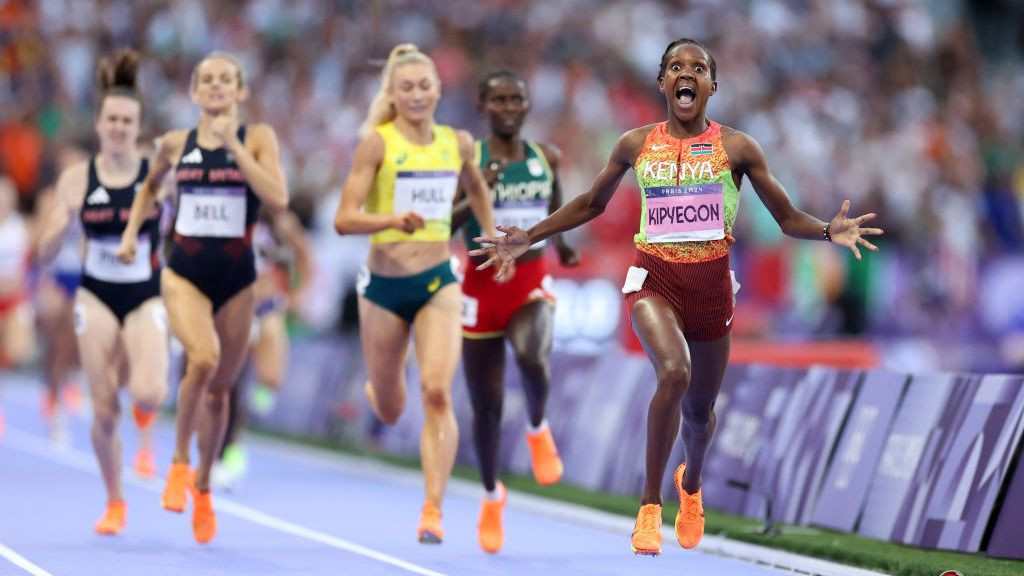 Faith Kipyegon of Team Kenya celebrates winning the Gold medal and setting a new Olympic record in the Women's 1500m Final . GETTY IMAGES