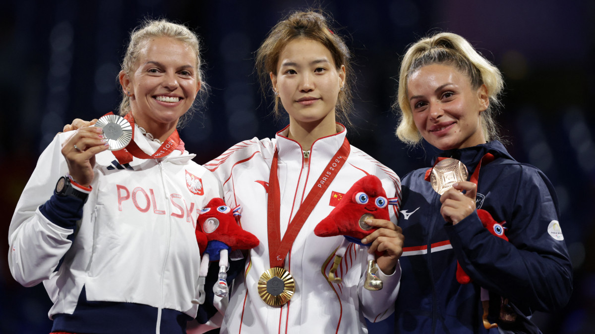 The podium of the women's sabre category A in Wheelchair Fencing. GETTY IMAGES