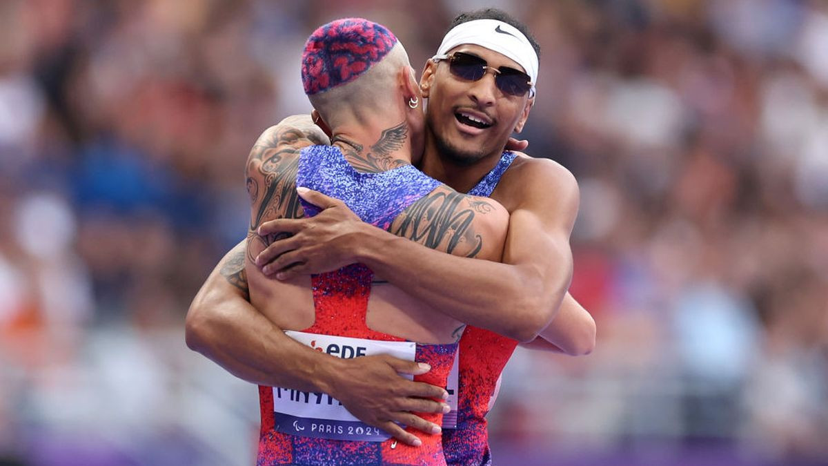 Jaydin Blackwell is congratuled by US' Nick Mayhugh. GETTY IMAGES