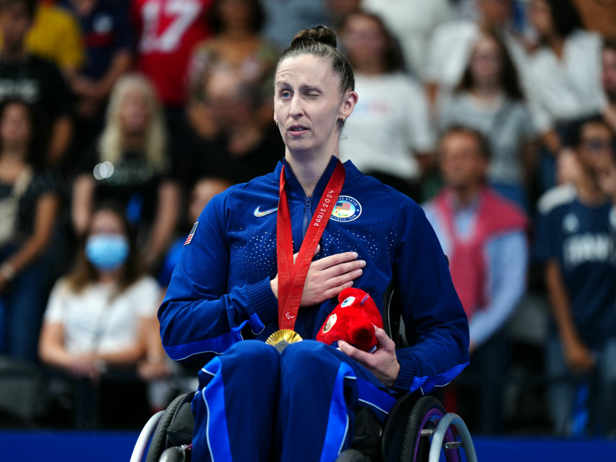 Gold medallist US Leanne Smith celebrates during the victory ceremony for the women's S3 100m freestyle final event at the Paris 2024 Paralympic Games. GETTY IMAGES