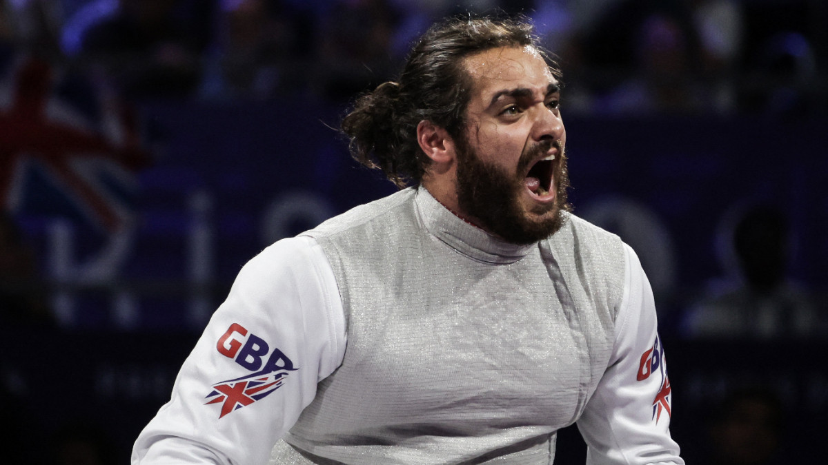 Great Britain's Dimitri Coutya shortly after winning the gold medal in the men's foil category B. GETTY IMAGES