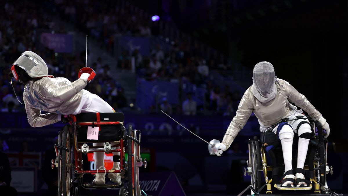 Rong competes against Jana in the women's sabre category B Gold Medal at Paris 2024. GETTY IMAGES