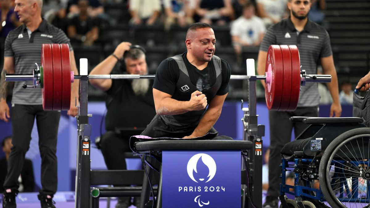 Qarada reacts after lifting during the Para Powerlifting Men's Up to 49kg Final. GETTY IMAGES