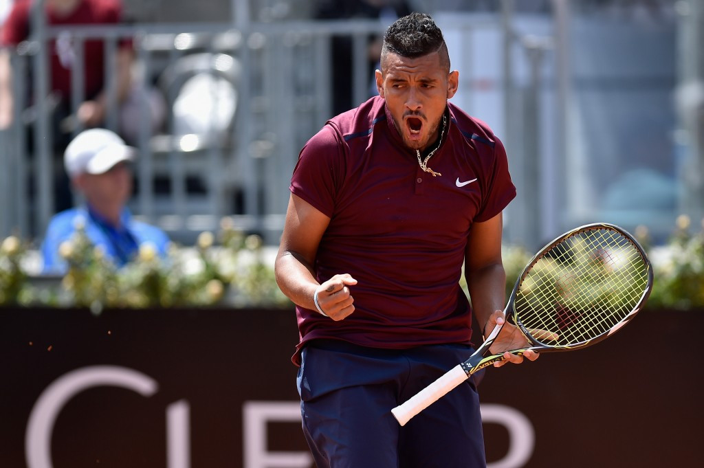 Nick Kyrgios moved into the second round with a straight sets win over Salvatore Caruso