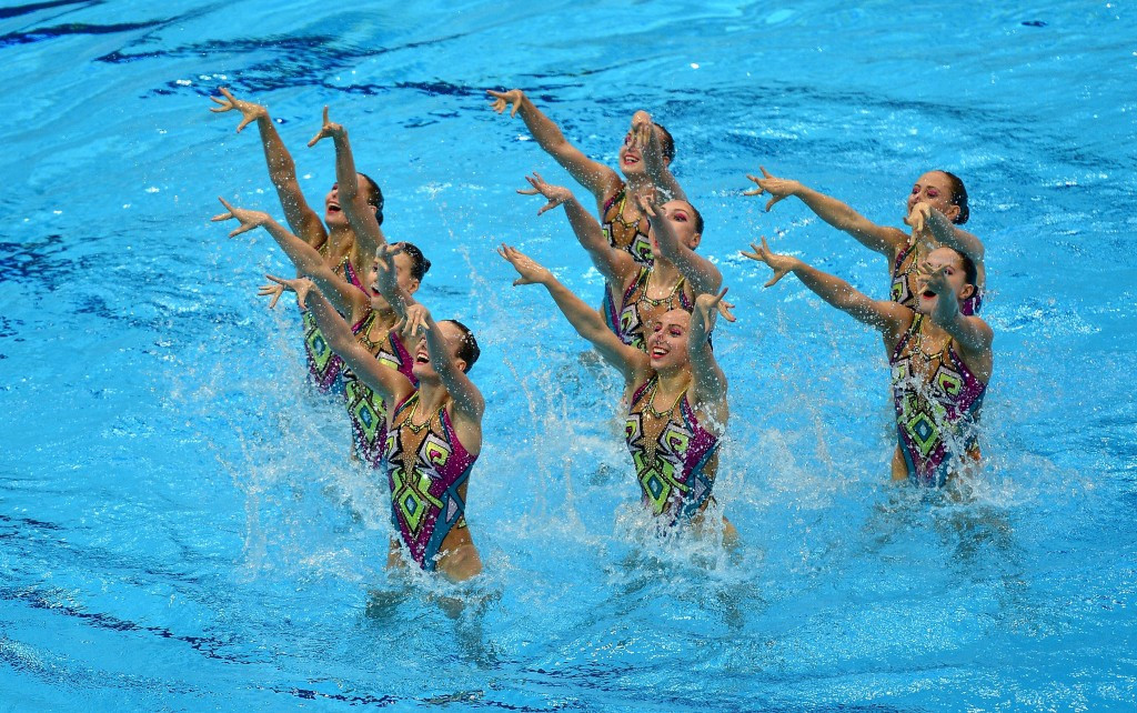 Favourites Russia claimed gold in the synchronised swimming team technical event
