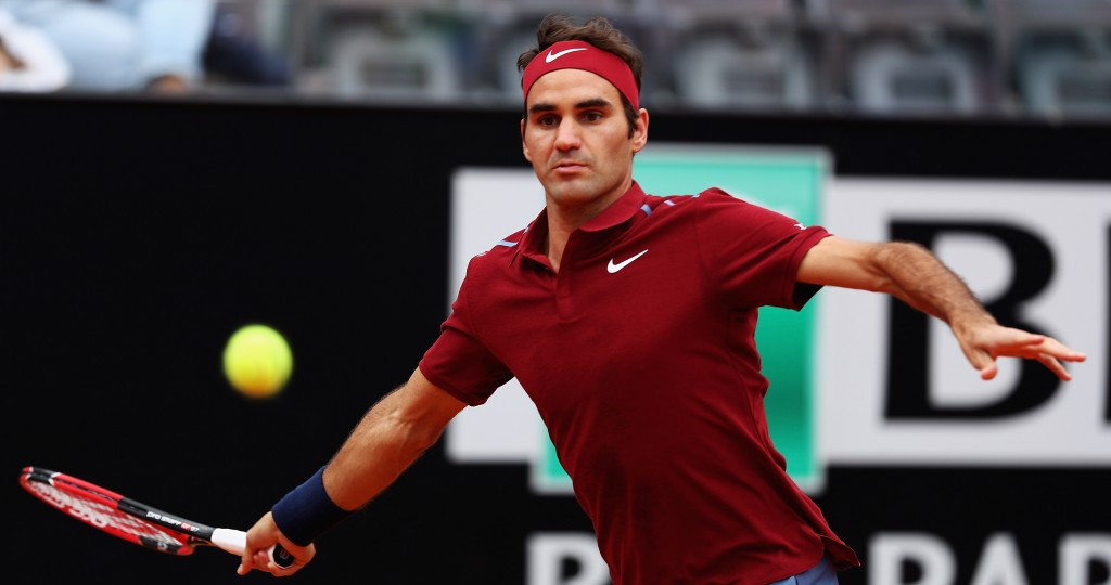 Federer returns to action with win at Italian Open but could pull out