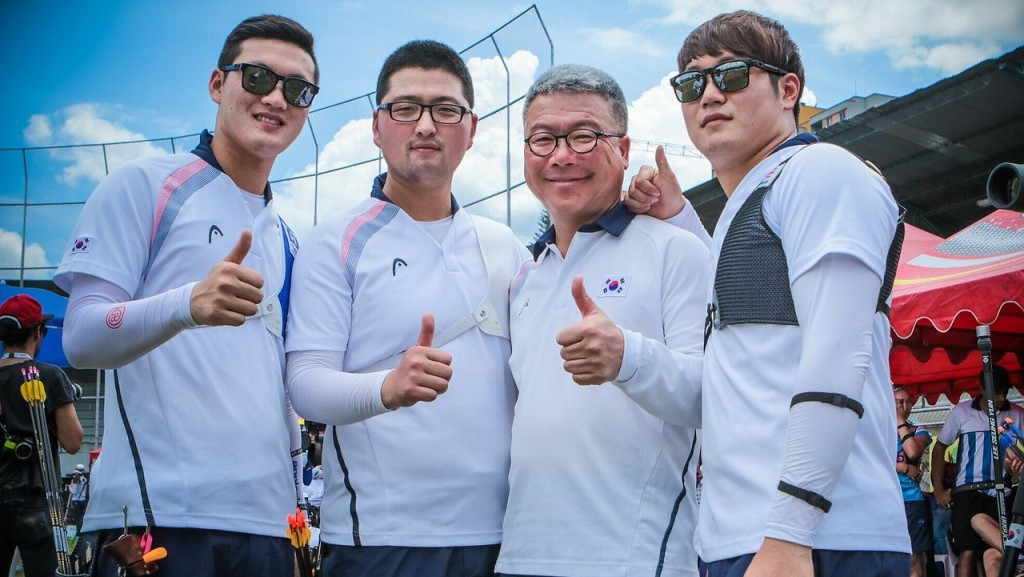 South Korea's Kim Woojin (centre, left) led the men’s recurve qualification round with 695 points
