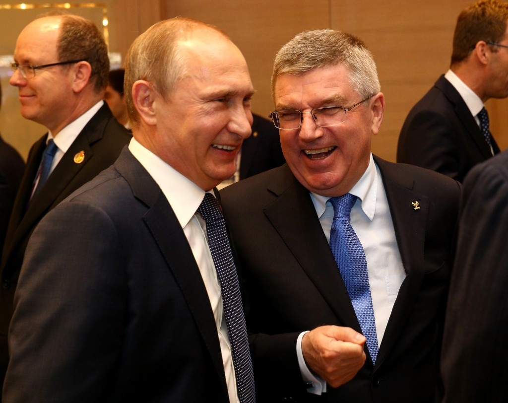 Thomas Bach, right, has ties with Russian President Vladimir Putin  ©Getty Images