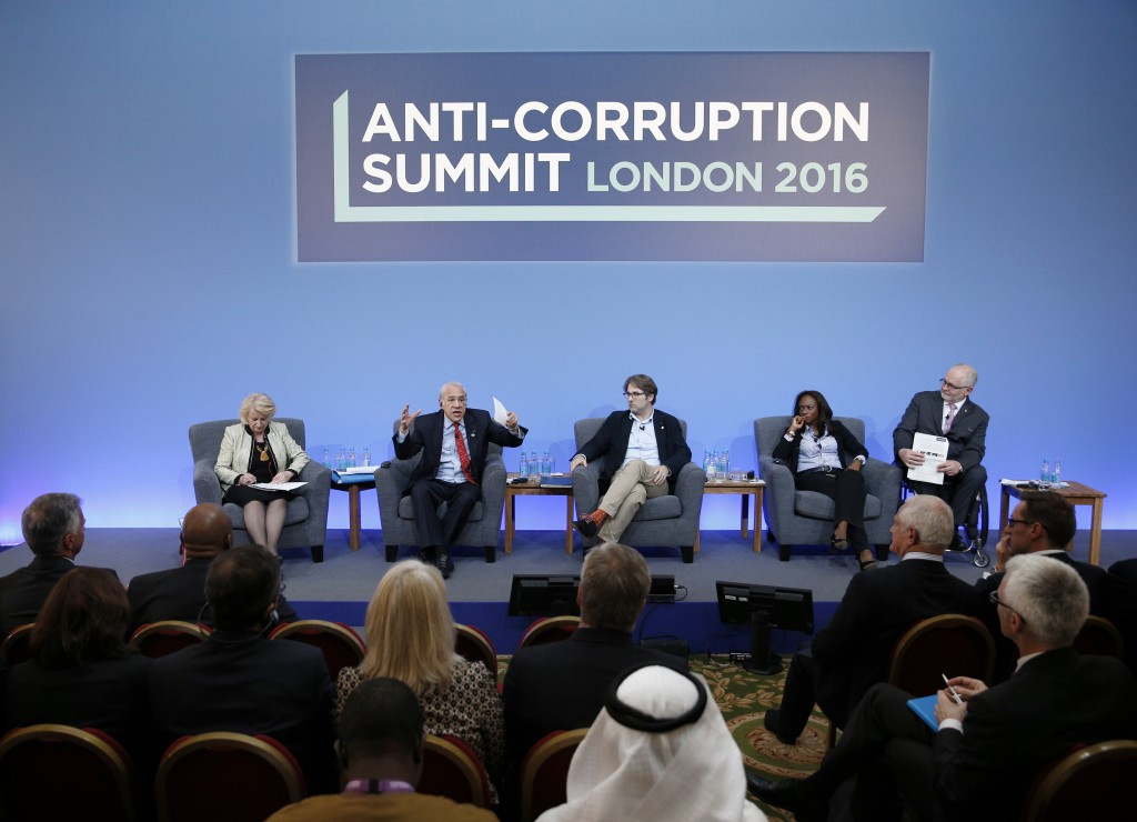 Jaimie Fuller, centre, spoke at an Anti-Corruption Summit organised by British Prime Minister David Cameron ©Getty Images