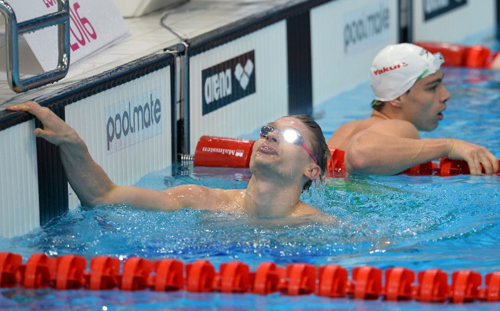 Radoslaw Kawecki reacts after claiming 200m backstroke victory ©Getty Images