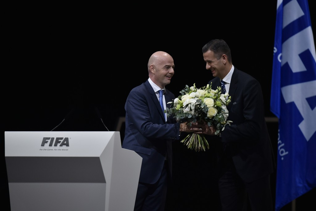 Markus Kattner (right) pictured with FIFA deputy secretary general Gianni Infantino following the latter's election at the FIFA Congress in Zurich ©Getty Images