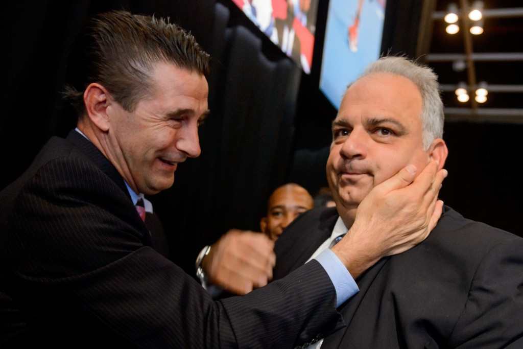 Nenad Lalovic (right) being congratulated by US actor and wrestling supporter, William Baldwin, after the sport was returned to the Olympic programme at the IOC Session in Buenos Aires ©Getty Images