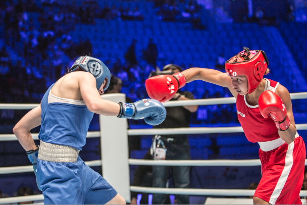 France's Estelle Mossely (red) beat Russia's Anastasiia Beliakova to the lightweight gold medal