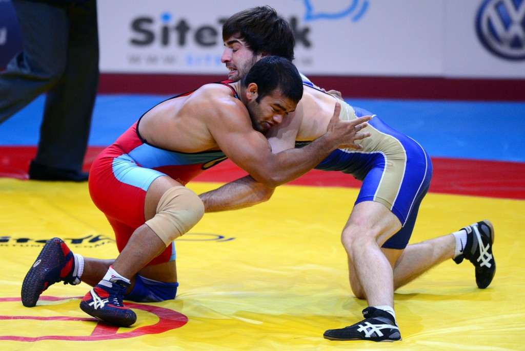 Narsingh Yadav (red) secured the Indian quota for Rio 2016 in the 74kg division with bronze at last year's World Championships in Las Vegas