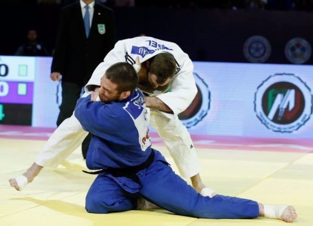 Travis Stevens triumph in the men's under 81kg event to secure seeding at Rio 2016 