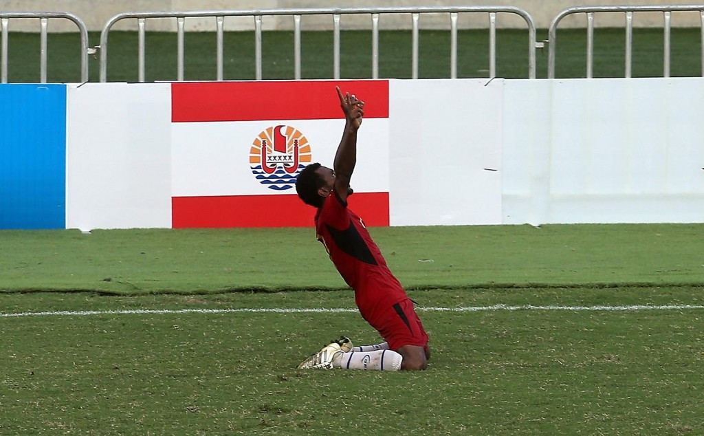Raymond Gunemba celebrates his second goal for Papua New Guinea before ten-man Tahiti struck back 